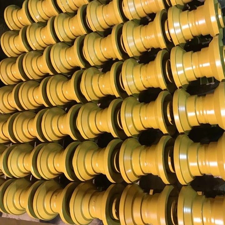 Suku cadang ekskavator di bawah sasis track roller sprocket idler roller atas Track roller bawah